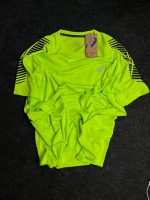 تیشرت رانینگ مردانه رانینگ اسیکس ASICS  مدل D1 طرح گرافیکی سرشانه –فسفری ASICS Men’s D1 Performance Running - Image 4